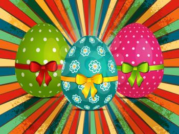 Easter Eggs Decorated with Ribbons and Bow Over Retro Starburst Background