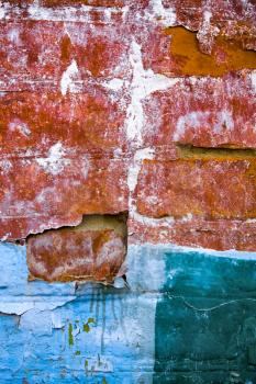 Royalty Free Photo of Peeling Paint on a Brick Wall