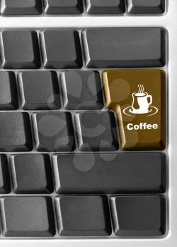 Royalty Free Photo of a Close-up of Computer Keyboard With a Coffee Key