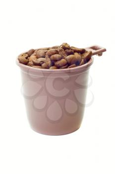 Royalty Free Photo of a Cup Full of Coffee Beans