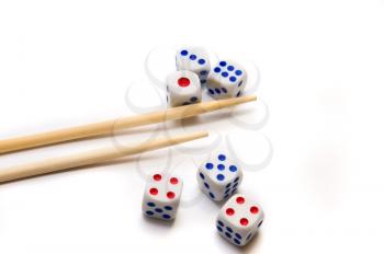 Royalty Free Photo of Chopsticks and Dice