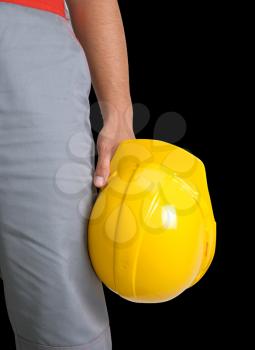 Royalty Free Photo of a Man Holding a Yellow Hardhat