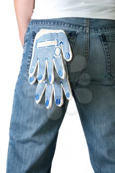 Royalty Free Photo of a Man With Gloves in His Back Pocket