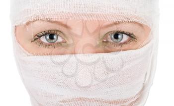 Royalty Free Photo of a Woman With Bandages on Her Face