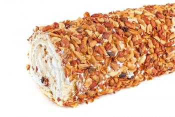 Royalty Free Photo of Nuts on a Swiss Roll