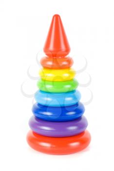 Plastic toy pyramid on a white background