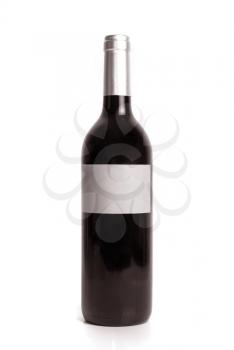 Bottle of red wine isolated on a white background.

