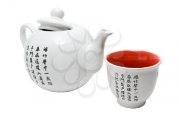 Tea-things in asian style with hieroglyphics. Isolated on white.