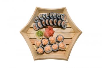 Royalty Free Photo of Sushi Rolls on a Wooden Plate