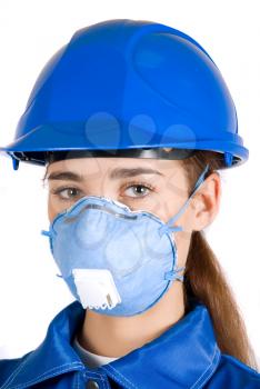 Royalty Free Photo of a Builder Wearing a Mask and Hardhat