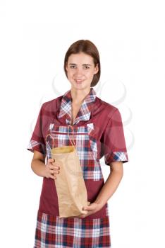 Royalty Free Photo of a Girl Holding a Bag of Bread