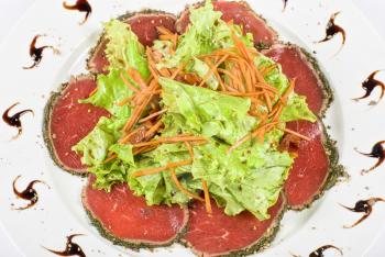 Royalty Free Photo of Sliced Beef With Salad