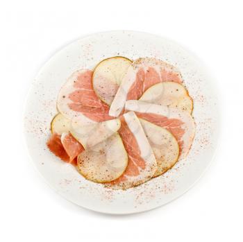Sliced bacon with sliced pear decorated isolated on a white