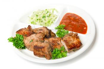 Royalty Free Photo of Grilled Meat With Sauce and Vegetables