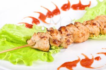Royalty Free Photo of a Grilled Chicken Skewer
