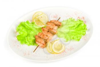 Royalty Free Photo of a Salmon Kebab on a Plate