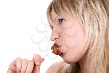 Royalty Free Photo of a Woman Sucking on a Lollipop