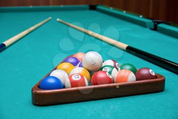 Royalty Free Photo of Billiard Balls on a Pool Table 
