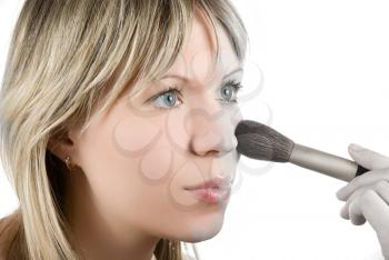 Royalty Free Photo of a Woman Applying Makeup 