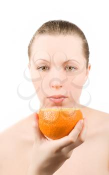 Royalty Free Photo of a Woman Holding an Orange