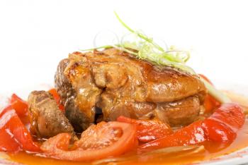 Royalty Free Photo of a Knuckle of Veal Baked With Vegetables