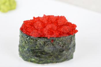 Royalty Free Photo of a Red Tobiko Sushi Roll 