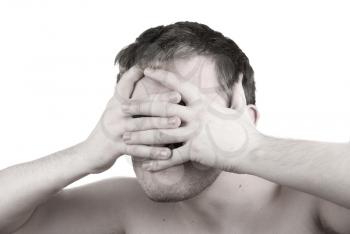 Royalty Free Photo of a Man Covering His Face