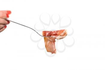 Royalty Free Photo of a Jamon Slice on a Fork