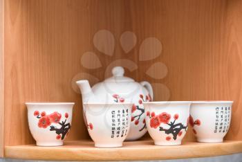 Royalty Free Photo of Chinese Tea Set With Teapot and Cups