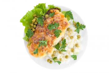 Chicken baked with pineapple and cheese very tasty dish with rice vegetables garnish