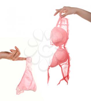 Royalty Free Photo of a Woman Holding Her Bra and Panties 