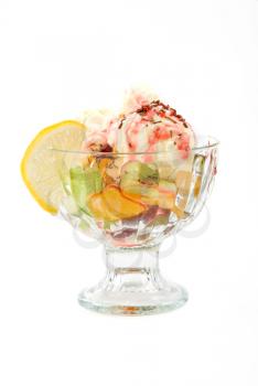 Tasty ice cream with fruits isolated on a white background
