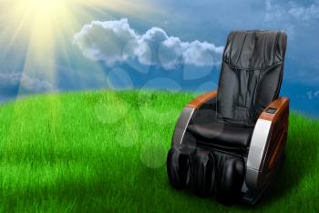 Royalty Free Photo of a Massage Chair in a Field