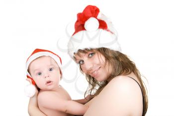 Royalty Free Photo of a Mother and Son Wearing Santa Hats