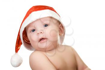Royalty Free Photo of a Baby Boy Wearing a Santa Hat