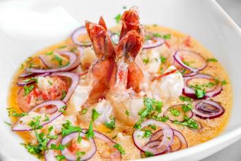 Royalty Free Photo of King Shrimps With Vegetables in Cream Sauce