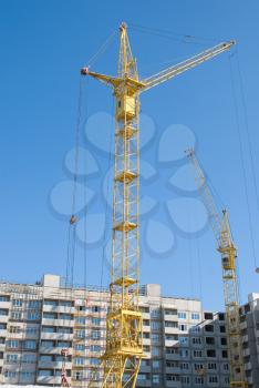 Royalty Free Photo of a Crane and Building Under Construction 