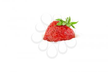 Royalty Free Photo of a Strawberry in Sour Cream
