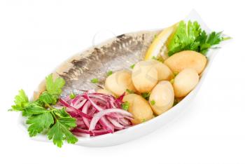 Tasty herring with potato and fresh vegetables