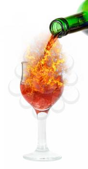 Royalty Free Photo of a Bottle Pouring Fire into a Glass