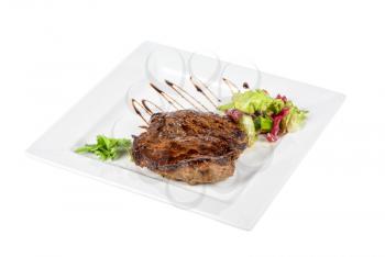 Royalty Free Photo of Beef Steak on a Plate With Vegetables