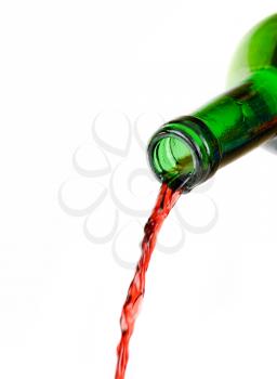 Royalty Free Photo of Red Wine Pouring Out of a Bottle