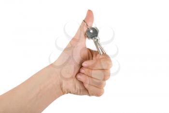 Royalty Free Photo of a Hand Holding a Silver Key 