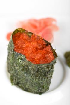 Royalty Free Photo of a Red Tobiko Sushi Roll