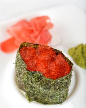 Royalty Free Photo of a Red Tobiko Sushi Roll