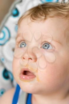 Royalty Free Photo of a Baby Boy With Food on His Face