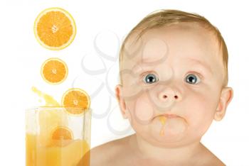 Royalty Free Photo of a Baby With Orange Juice