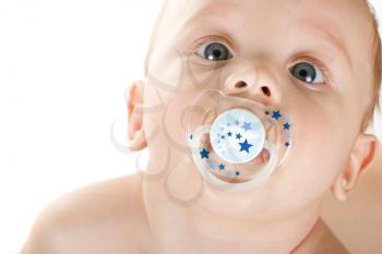 Royalty Free Photo of a Baby With a Pacifier 