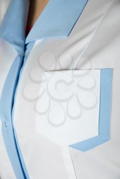 Royalty Free Photo of a Doctors Smock Closeup of Female Nurse