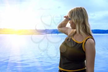 Royalty Free Photo of a Woman Looking at the Water